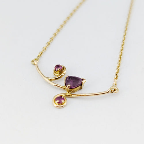 Collier Collier en or jaune  et rubis 58 Facettes 32891