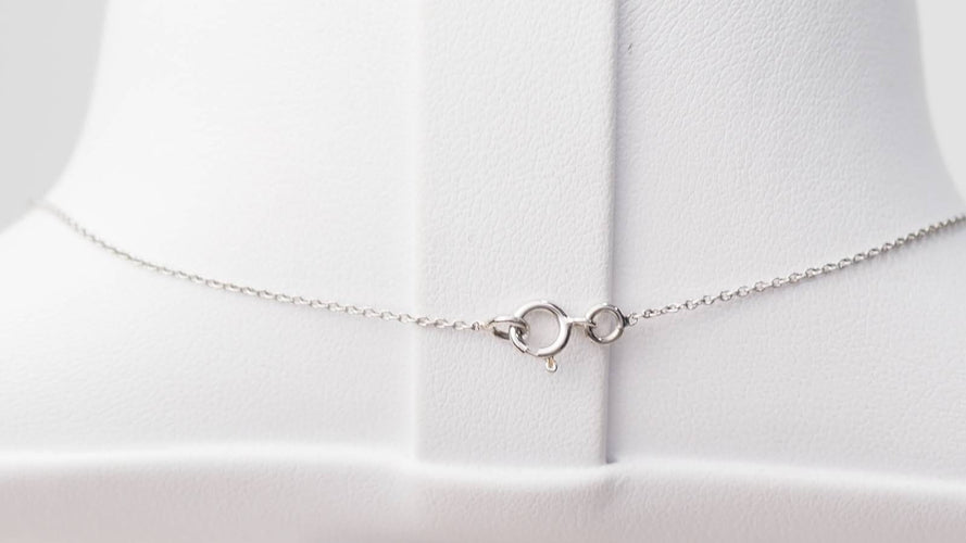 Collier Collier solitaire en or blanc et topaze bleue 58 Facettes CLAL