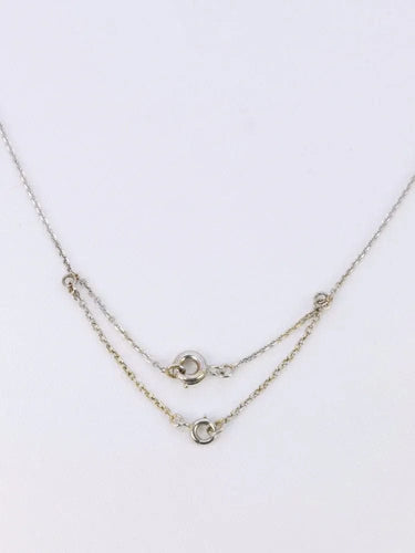 Collier Collier noeud Belle Epoque or blanc diamant poire taille ancienne 58 Facettes J542