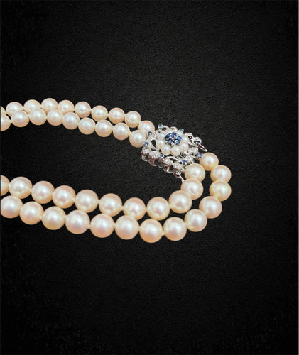 Collier Magnifique collier de perles à double rang 58 Facettes