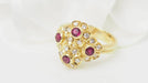 Bague 50 Bague marguerite en or jaune rubis et diamants 58 Facettes 32803