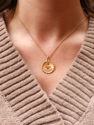 Pendentif Médaille amour Augis ronde Plus qu'hier moins que demain or jaune rubis 58 Facettes J510