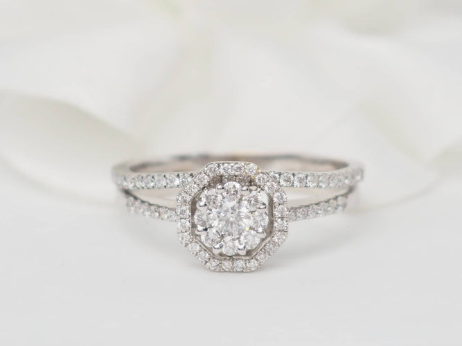 Bague 60 Bague solitaire en or blanc et diamants 0.66ct 58 Facettes 21835/30916