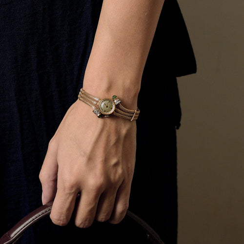 Montre Montre ancienne UTI en or jaune 58 Facettes