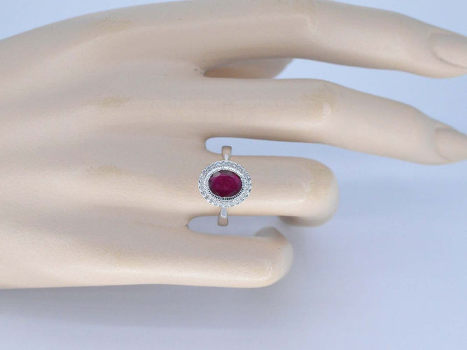 Bague 54 Bague entourage en or blanc avec diamants et rubis 58 Facettes 2060