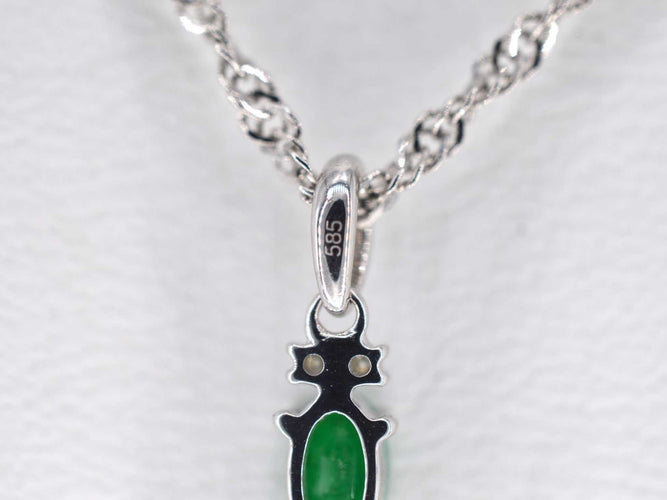 Pendentif Pendentif en or blanc avec diamants et émeraude 58 Facettes 2140