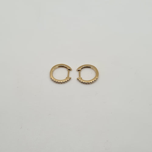 Boucles d'oreilles Créoles or jaune 18 carats serties de diamants 58 Facettes