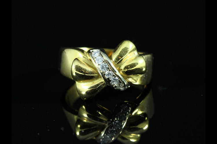Bague 50 Bague noeud diamants 58 Facettes A1542