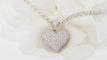 Collier Collier pendentif coeur en or blanc et diamants 58 Facettes 31370