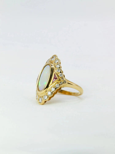 Bague marquise or jaune opale diamants