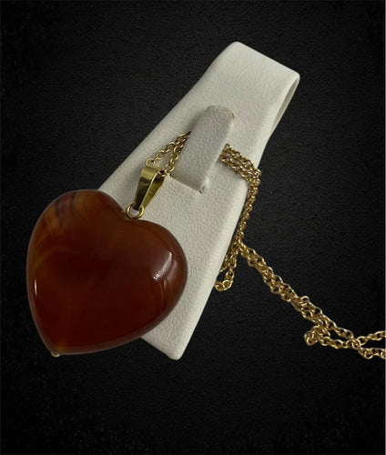 Pendentif Pendentif en cornaline, signé De Poli 58 Facettes