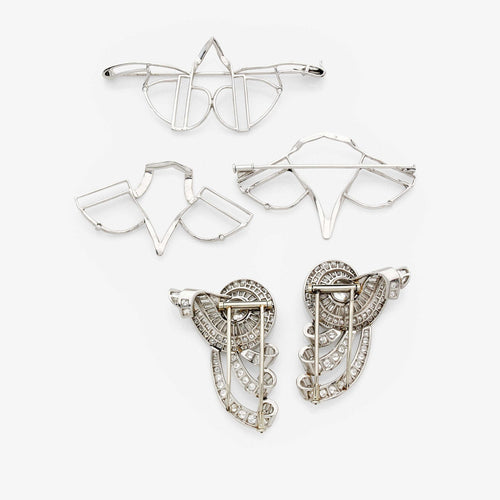 Boucles d'oreilles Clips convertibles vintage en platine et diamants français des années 1950 58 Facettes 22707