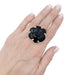 Bague 55 Bague Chanel, modèle "Camélia", en or blanc et onyx. 58 Facettes 34027