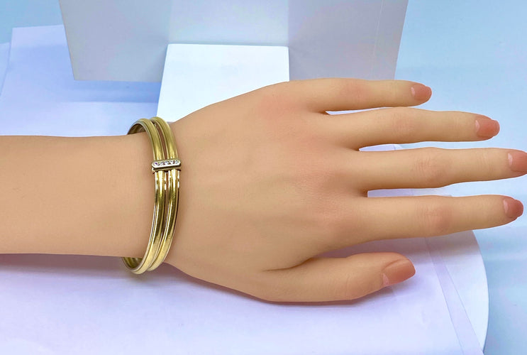 Bracelet Bracelet double joncs, or blanc, diamants, Yves Saint Laurent 58 Facettes AB601