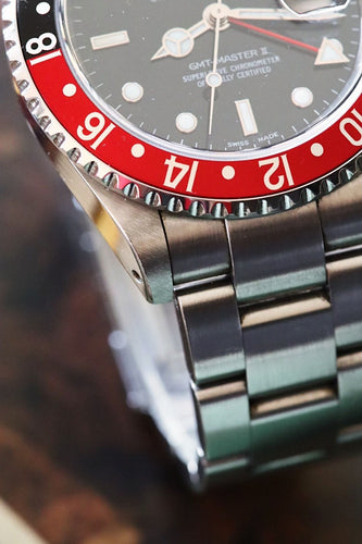 Montre Rolex GMT-Master II 16710 “Coke” rouge et noire, full set 58 Facettes
