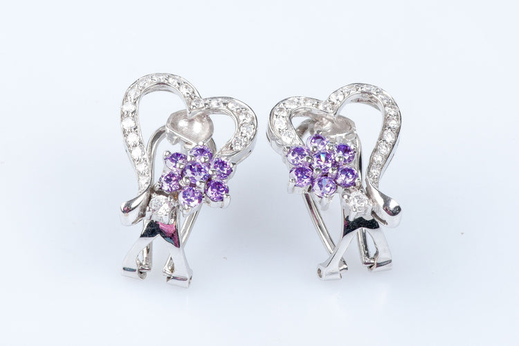Bague Bague coeurs et fleurs en or blanc 18 carats 58 Facettes 111.20995-53