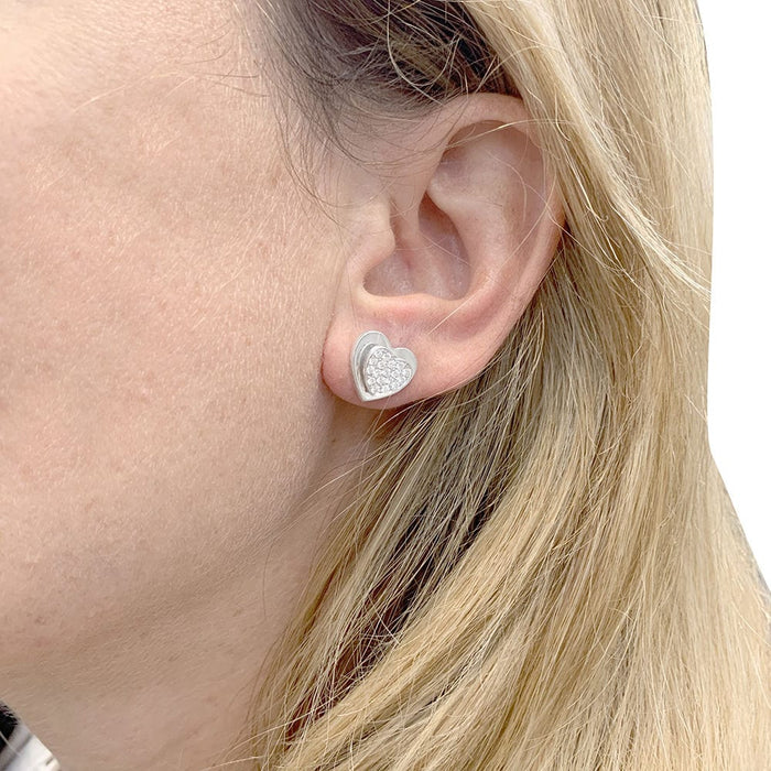 Boucles d'oreilles Boucles d'oreille Piaget "Coeur" or blanc, diamants. 58 Facettes 33963