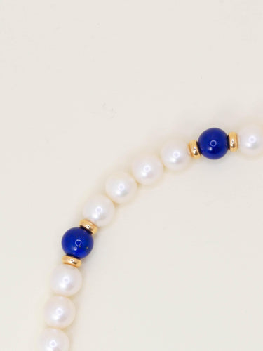 Collier DINH VAN Collier menottes R10 perles  & lapis lazuli 58 Facettes 1204.7