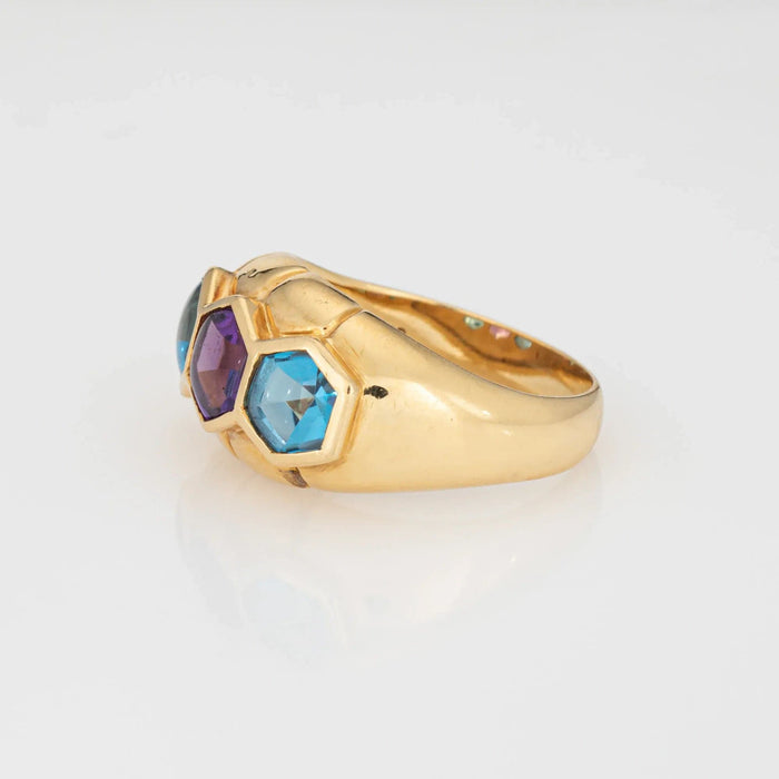 Bague vintage en or jaune avec améthyste et topaze bleue