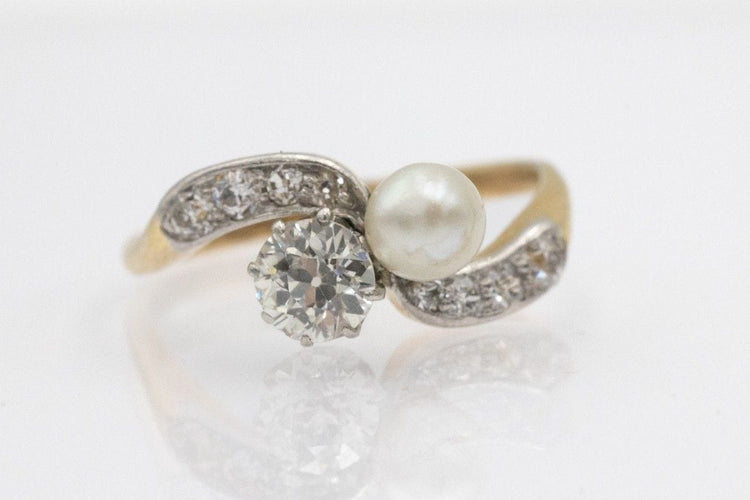 Bague 55 Bague « toi et moi » en or jaune et platine avec perle et diamants, première moitié du XXe siècle. 58 Facettes 11480