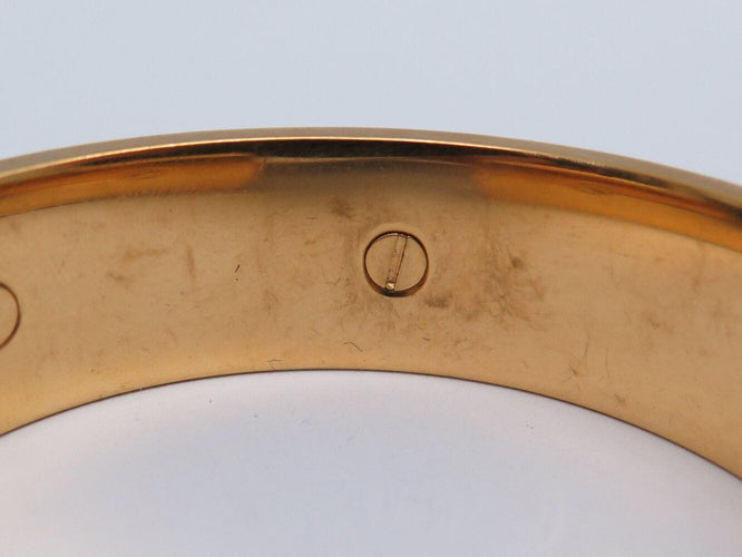 Bracelet bracelet HERMES jonc en cuir vert et metal dore en metal 58 Facettes 272252