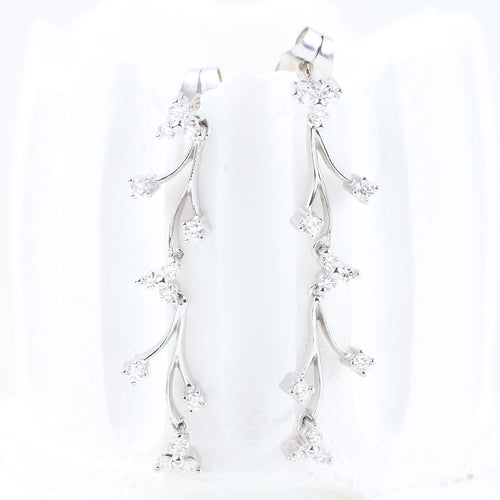 Boucles d'oreilles Boucles d'oreilles en or blanc avec diamants taille brillant 58 Facettes 133721D