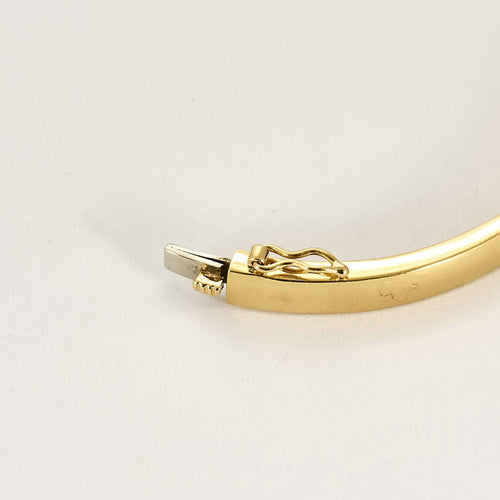 Bracelet Bracelet jonc en or jaune, diamants et saphirs 58 Facettes GAP1474