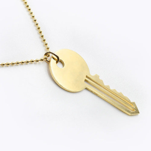 Collier Collier pendentif clé en or et diamants 58 Facettes 18134