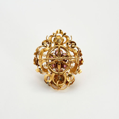 Broche Broche à décor de rinceau et fleurs avec émail noir, perles et grenats 58 Facettes