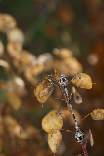Broche Trésor des années 20 : la grâce géométrique d'une broche décorative 58 Facettes 21096-0063
