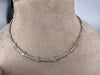 Collier Collier tennis en or blanc 18 carats avec diamants jaunes 58 Facettes G-439