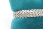 Bracelet Bracelet or blanc, maille tissée fantaisie 58 Facettes 240054