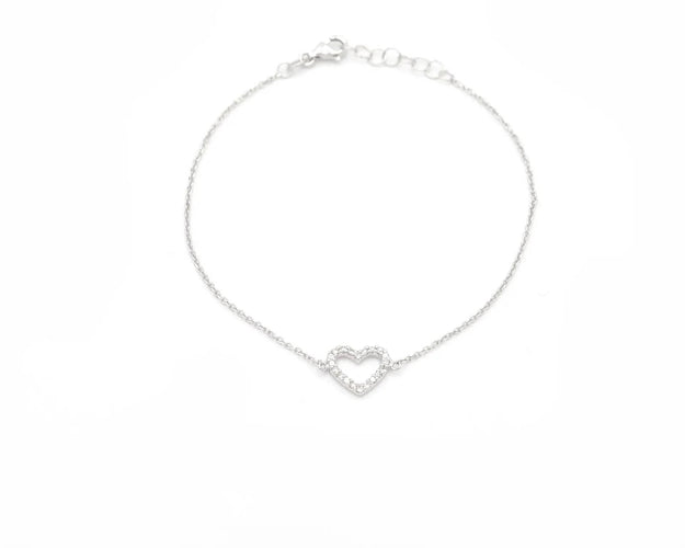 Bracelet Bracelet en or blanc avec pendentif en forme de cœur et diamants 58 Facettes 13780