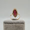 Bague 57 Bague or rose sertie d'une pierre rose 58 Facettes