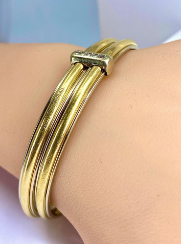 Bracelet Bracelet double joncs, or blanc, diamants, Yves Saint Laurent 58 Facettes AB601