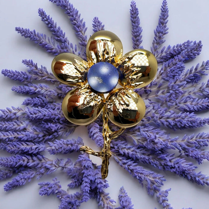 Broche CHAUMET - Broche marguerite Lapis-Lazuli Or Jaune 58 Facettes