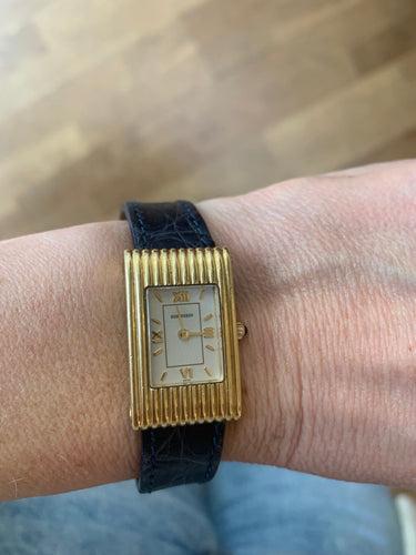 Montre Boucheron - Montre Reflet Small en or jaune 18 carats 58 Facettes M104