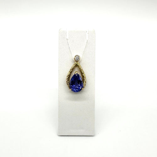 Pendentif Pendentif or jaune, tanzanite et diamant 58 Facettes Z15B51652