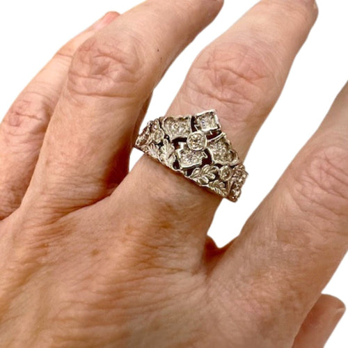 Bague 53.5 Bague contemporaine du XXe siècle en or 18 carats avec diamants, 9 pièces 58 Facettes Q125B