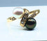 Bague Bague en or jaune 18 carats, perle de Tahiti, perle de culture blanche et diamants 58 Facettes AB264