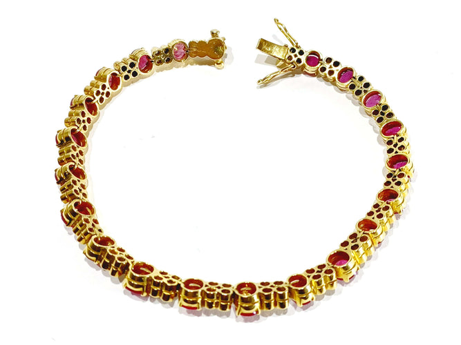 Bracelet or jaune diamants rubis