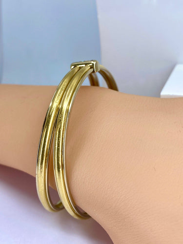 Bracelet Bracelet double joncs, or blanc, diamants, Yves Saint Laurent 58 Facettes AB601