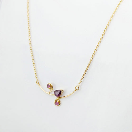 Collier Collier en or jaune  et rubis 58 Facettes 32891