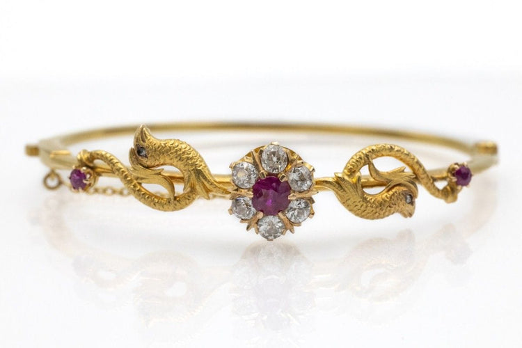 Bracelet Bracelet ancien motif phénix en or jaune 14k avec rubis et diamants 58 Facettes 11397