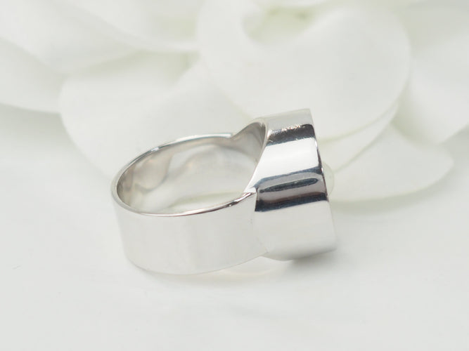 Bague vintage Dinh Van en or blanc et perle de culture