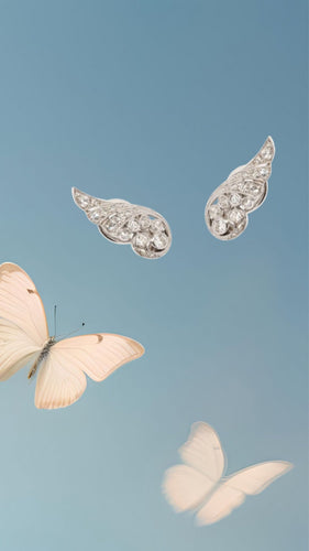 Boucles d'oreilles Boucles d'Oreilles Ailées Diamants Or Gris 58 Facettes BO233