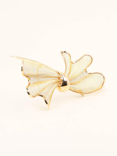 Broche Broche nœud papillon or jaune 58 Facettes 1210.2