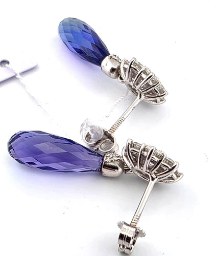 Boucles d'oreilles Boucles d'oreilles en or blanc serties de diamants et de tanzanite 58 Facettes