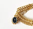 Bracelet Bracelet maille américaine or jaune 18 carats et breloques - 17 cms - 36.25 grs 58 Facettes