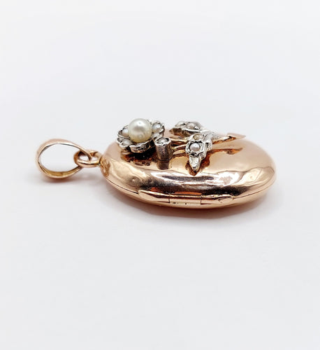 Pendentif Pendentif porte-photo or rose et argent, perles (circa 1900) 58 Facettes A05863